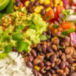 Mouthwatering mushroom burrito with smoky black beans, avocado, and colorful veggies.