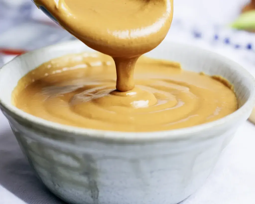 PB2 Peanut Sauce made with powdered peanut butter, soy sauce, and vinegar for a healthy dip.
